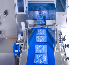 SleekWrapper automated flow wrapping machine wrapping medical devices